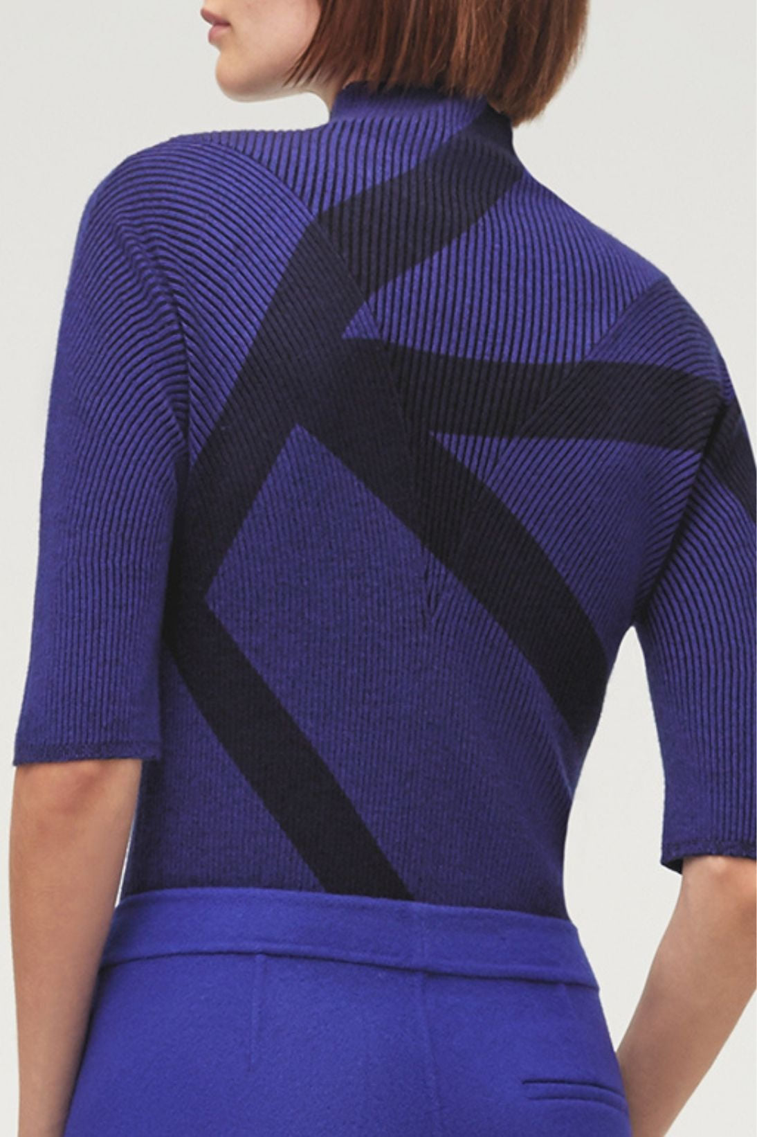 MOCKNECK W/ CIRCULAR KNIT SLEEVE